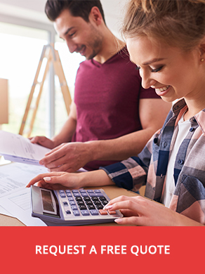 Couple looking at tablet while discussing their finances.